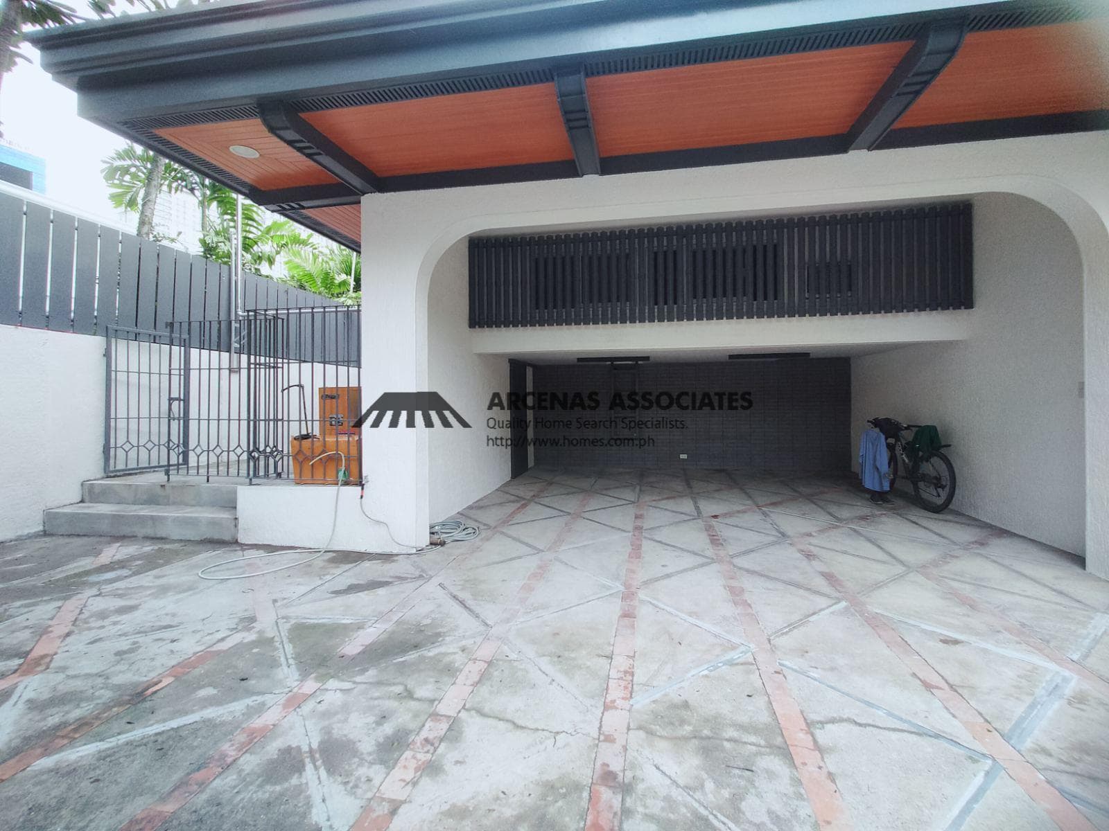 Two-Storey Tropical-Modern Residence - photo 2