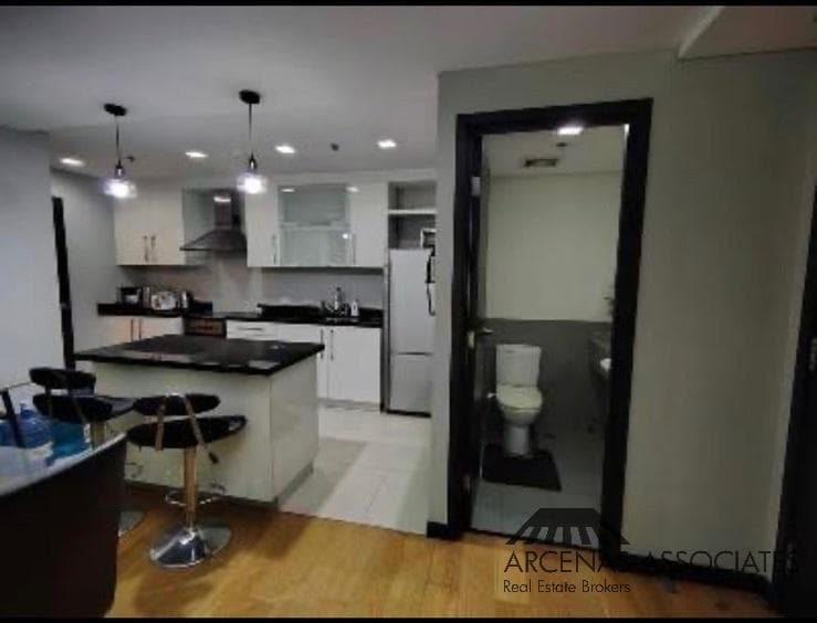 Cozy 2-Bedroom at One Serendra - photo 3