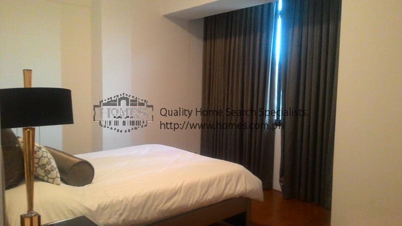 Fully furnished 2-bedroom condominium at Arya Residences - photo 3