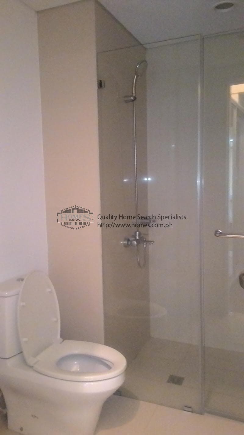 Fully furnished 2-bedroom condominium at Arya Residences - photo 4
