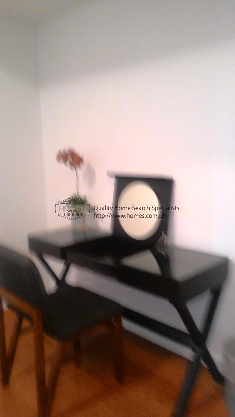 Fully furnished 2-bedroom condominium at Arya Residences - photo 5