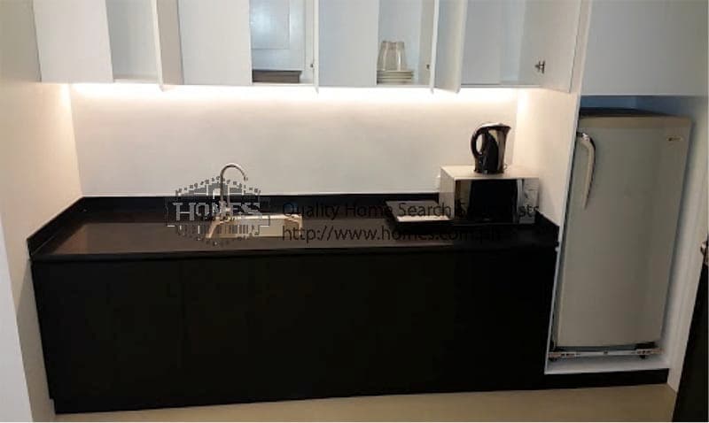 Neat 2 bedroom Condominium at W Tower - photo 5
