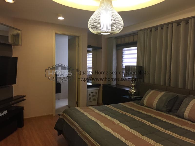 classy fully furnished 2-bedroom condominium - photo 3